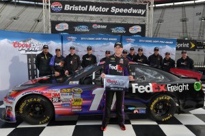 Denny Hamlin celebrates winning the pole position (Drew Hallowell/Getty Images for NASCAR)