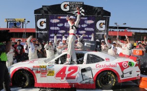 Kyle Larson in Victory Lane (photo - Jerry Markland/Getty Images for NASCAR)