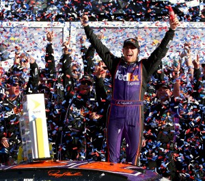 Denny Hamlin celebrates winning the Daytona 500 (photo - NASCAR via Getty Images)