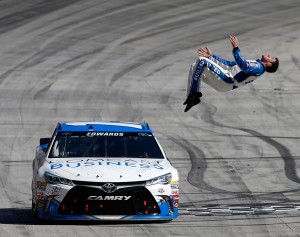 Carl Edwards does his trademark celebratory backflip after winning the Food City 500 (photo - NASCAR via Getty Images)