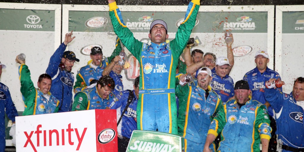 Aric Almirola celebrates his win (photo - NASCAR via Getty Images)