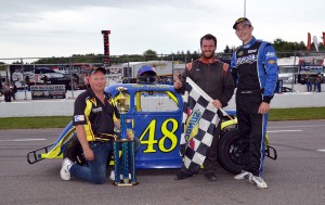 Alex Pacheco with Farrell Racing's Billy Farrell (left) and Waylon Farrell (right) - photo by Ken MacIsaac